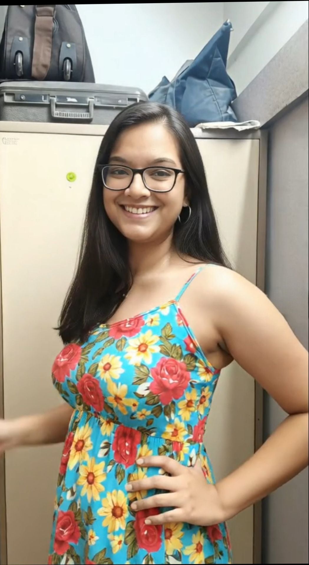 Smiling Indian girl in glasses goes nude for lover